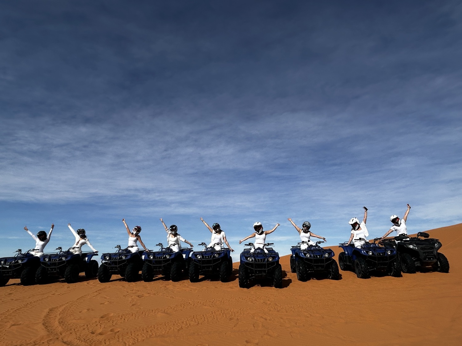 Students on a desert quad bike tour